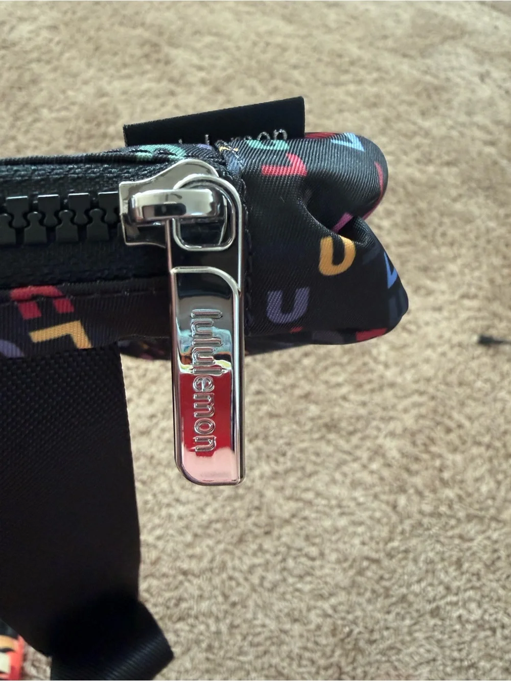 lululemon athletica Black belt bag with Multicolor with spell out Print